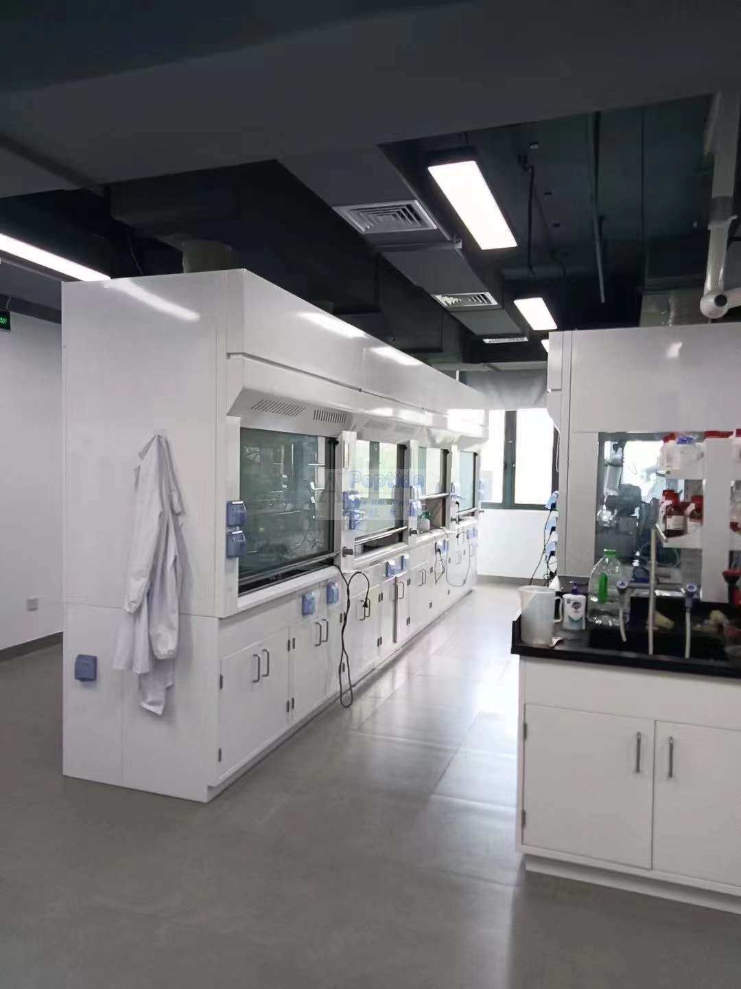 Laboratory fume-hood workspace in supplied project materials